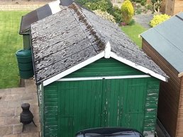 Asbestos roof garage before